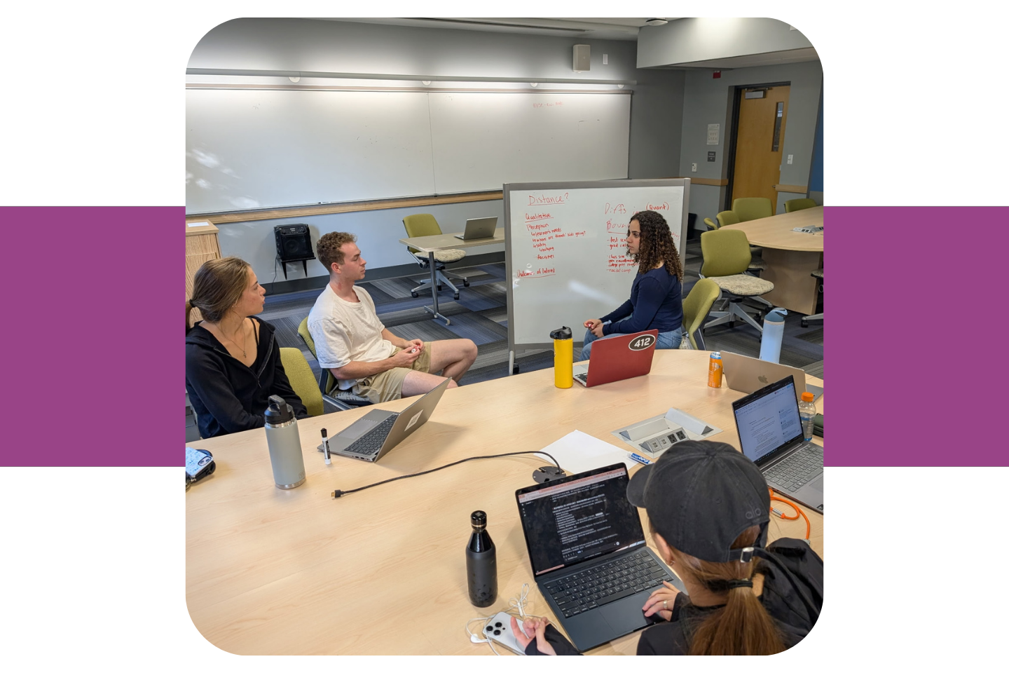 A group of sociology students collaborate in a classroom.